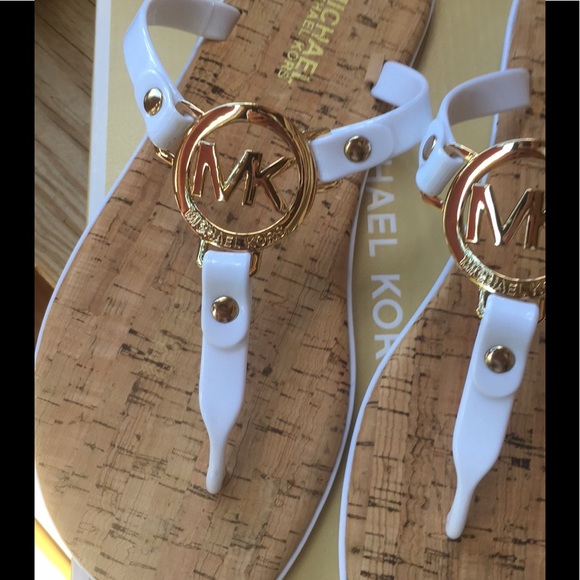 white and gold flip flops